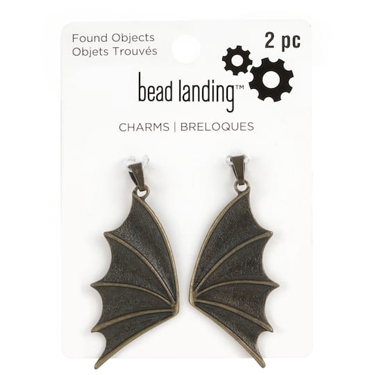 12 Packs: 2 ct. (24 total) Found Objects Brass Oxide Wing Charms by Bead Landing&#x2122;